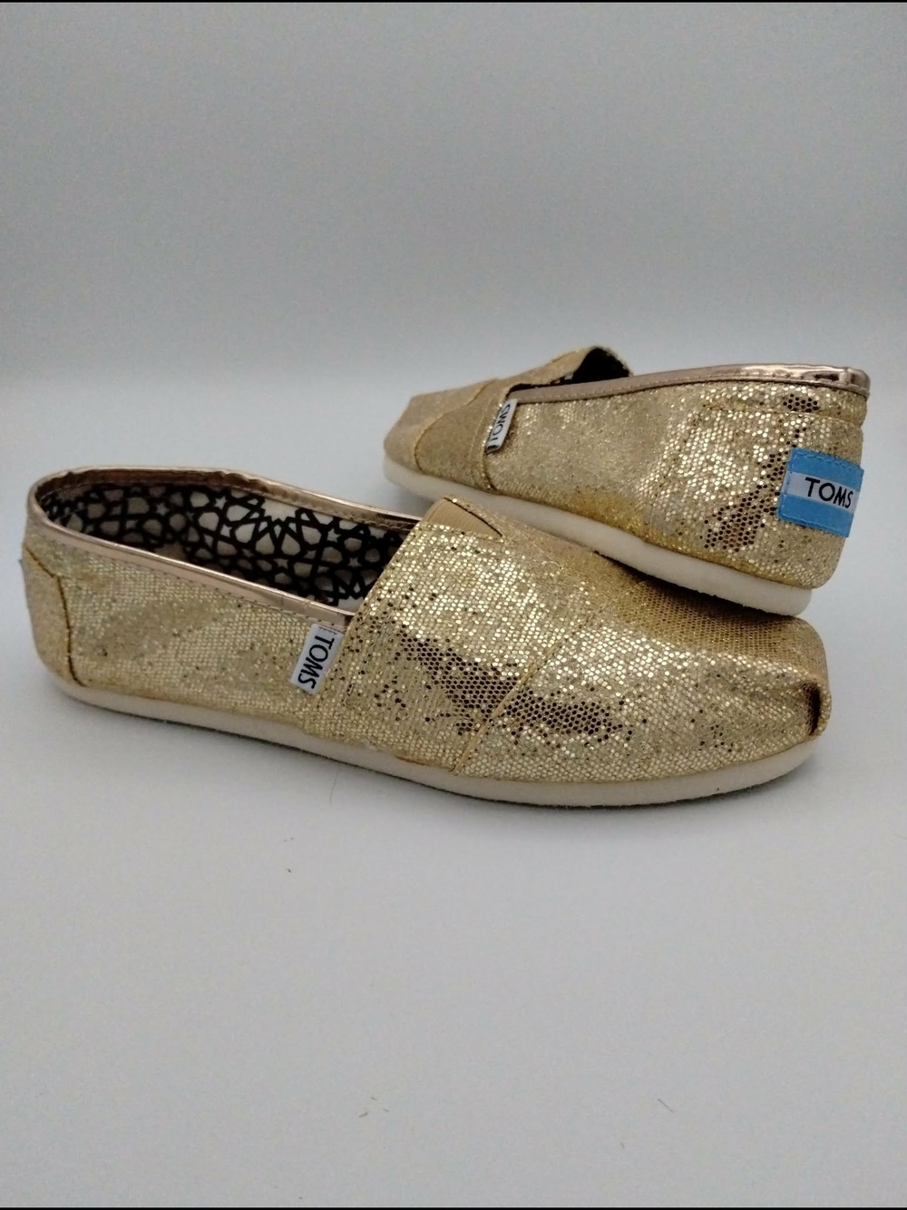 TOMS Gold Glitter Slip-On with Black & White Lining Size 7.5